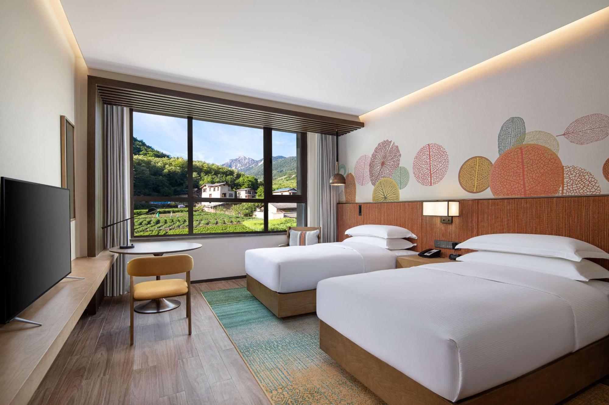 Hilton Garden Inn Jiuzhaigou Extérieur photo